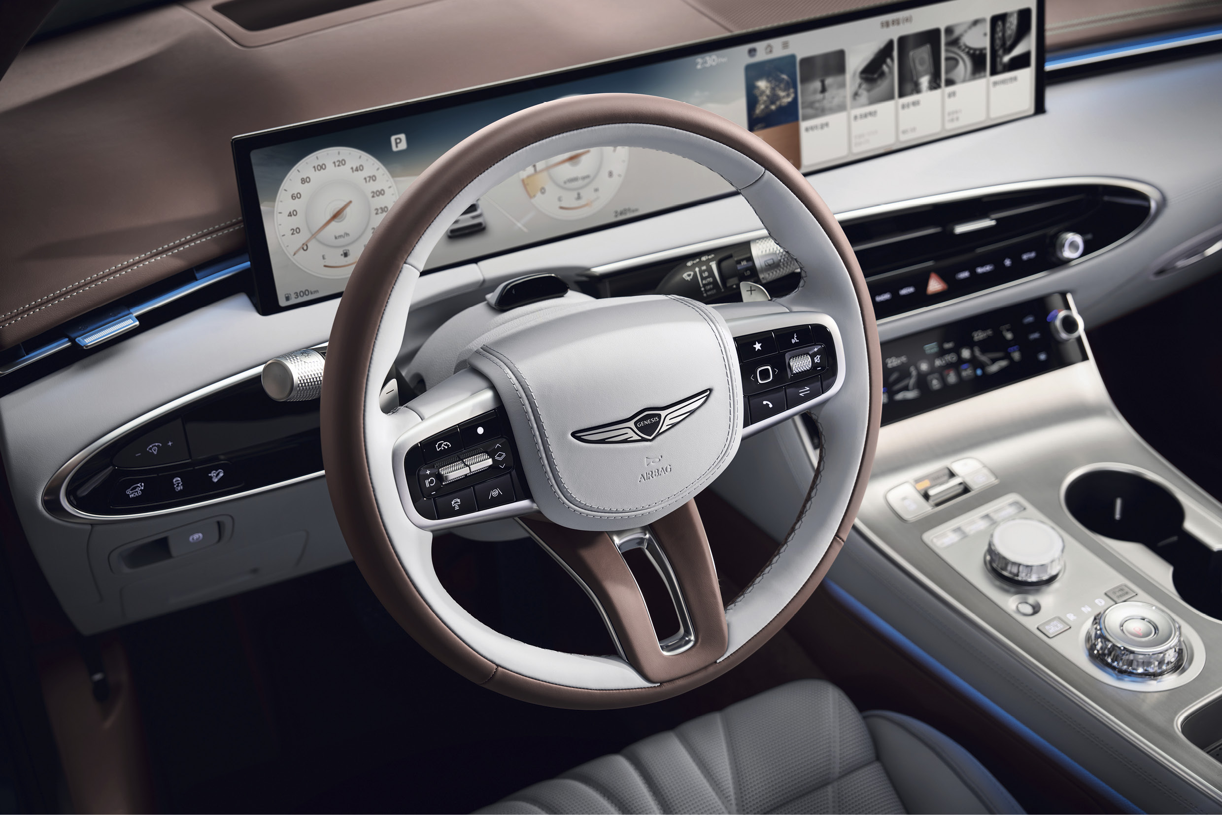 A picture of the steering wheel of the GV70