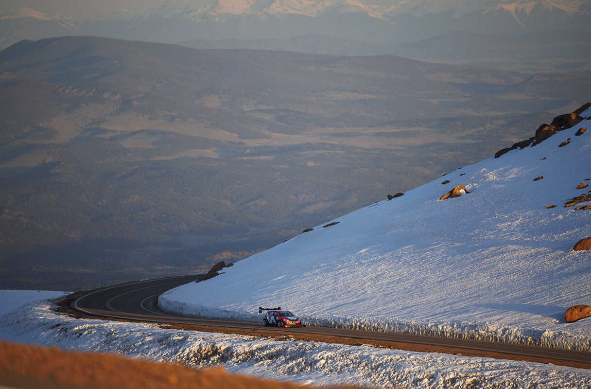 race car racing down the Pikes Peak course