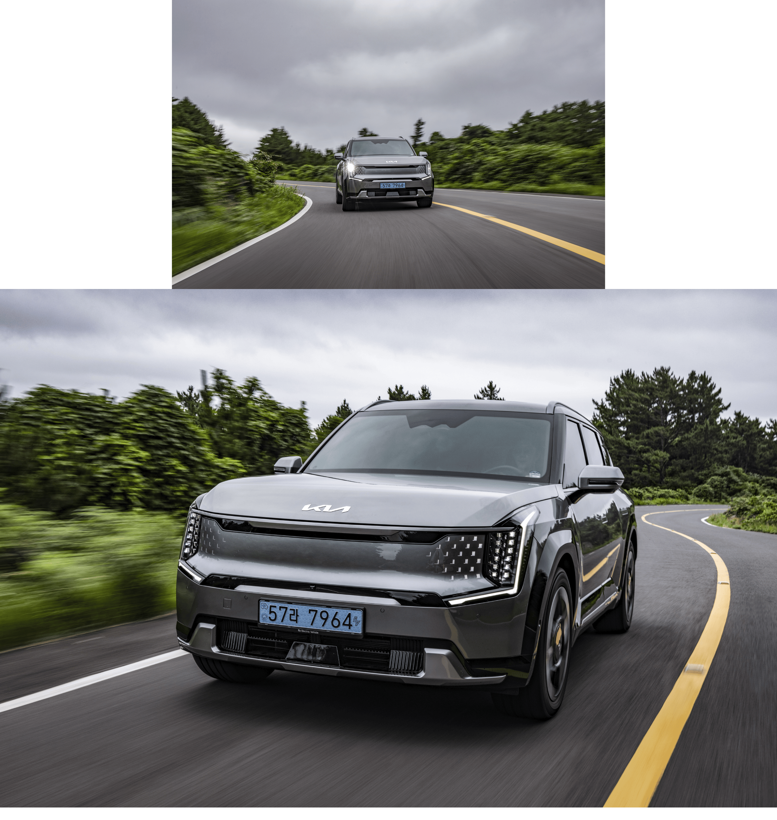 A front view of a gray SUV driving down a mountain path