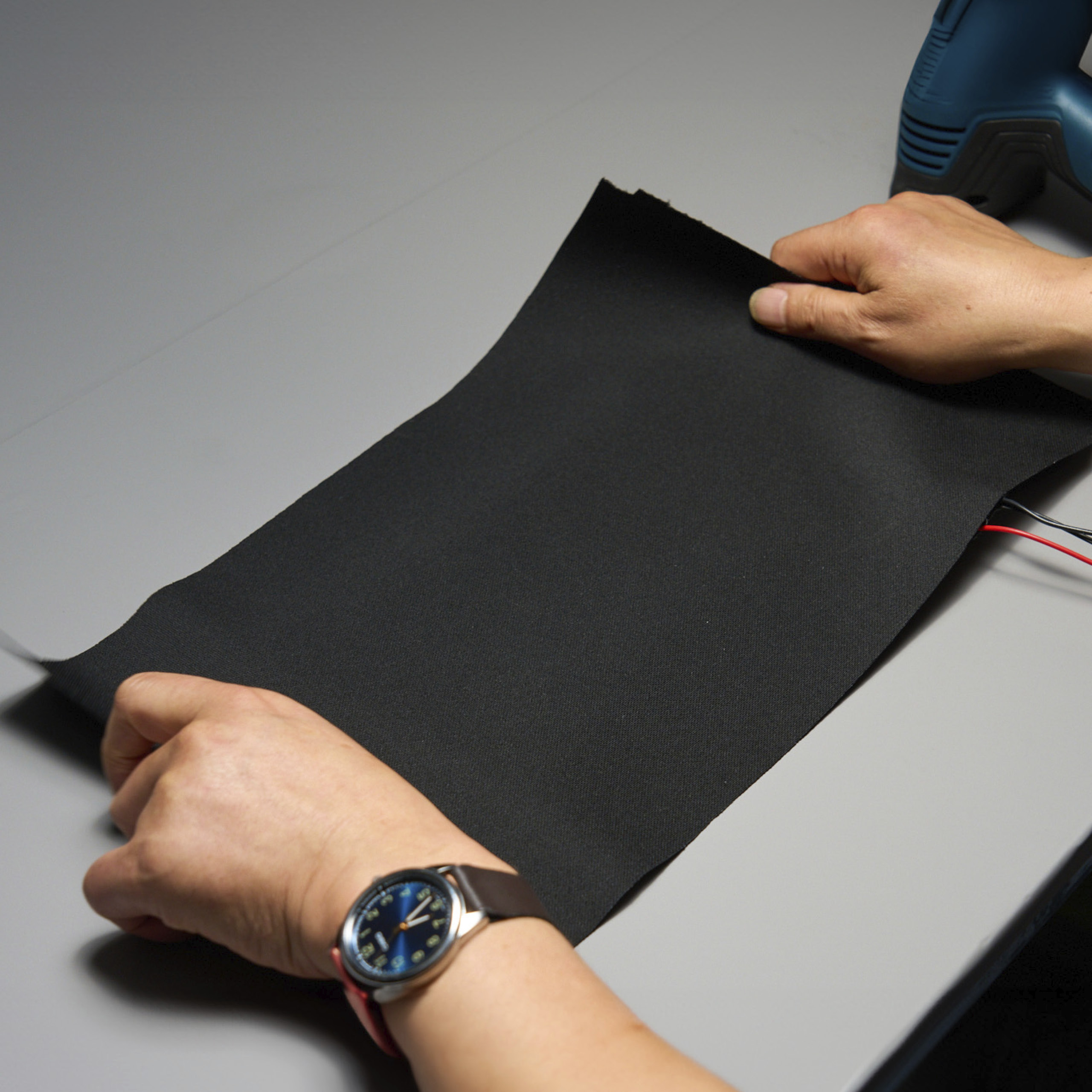 Demonstrating the process of manufacturing radiant heating systems