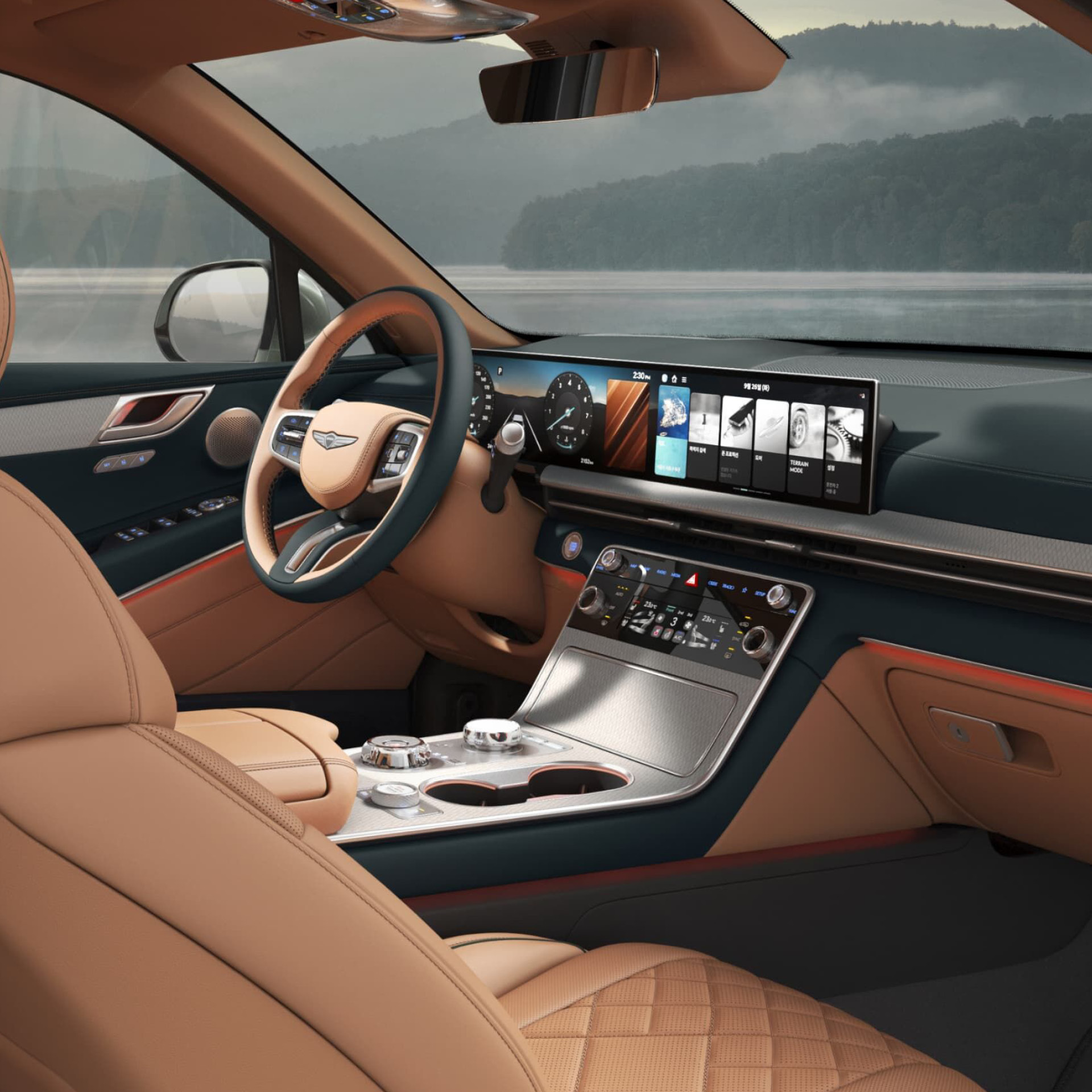 인포테인먼트가 작동하는 제네시스 모델 1열 실내 측면 모습