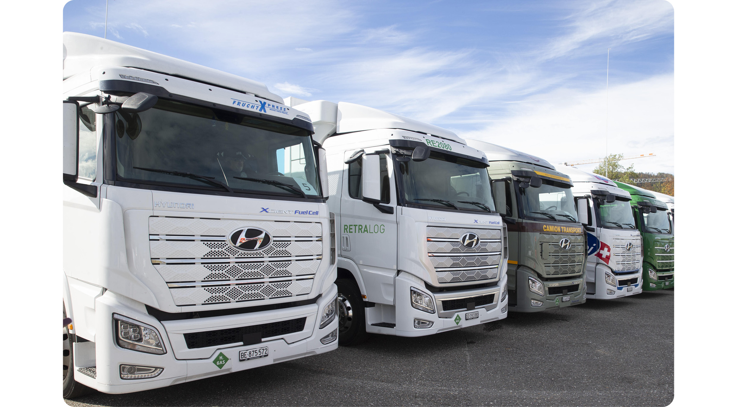 the appearance of several large trucks parked
