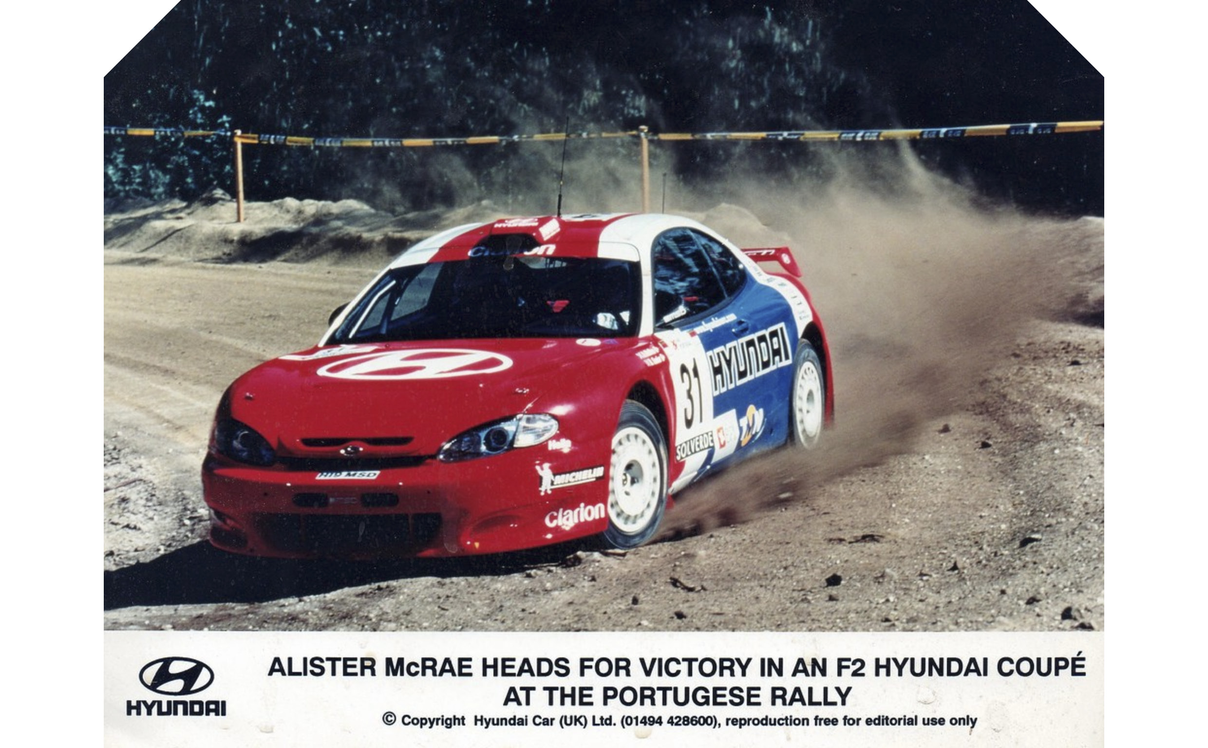 Tiburon rally car driving off-road
