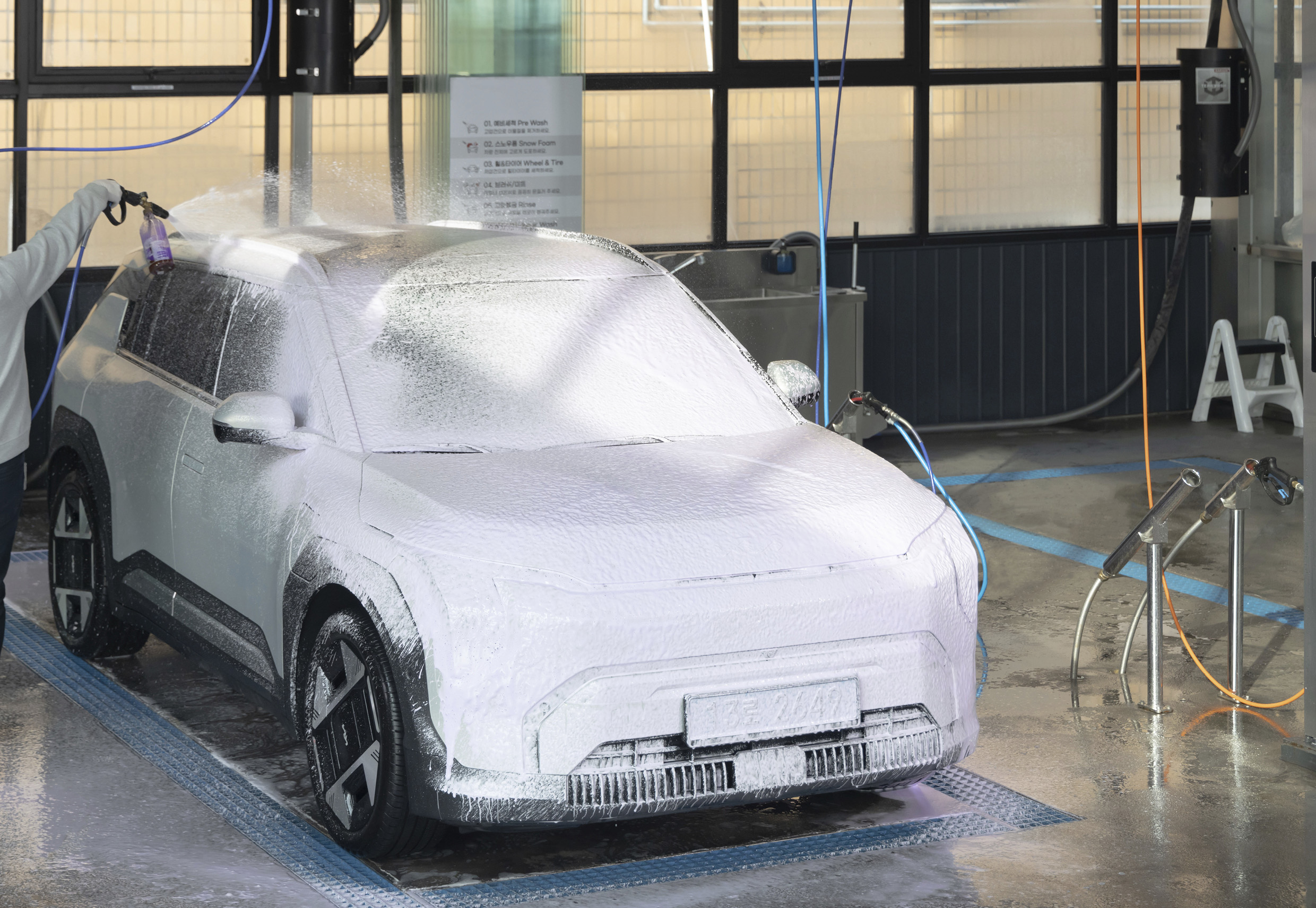 car covered in foam detergent