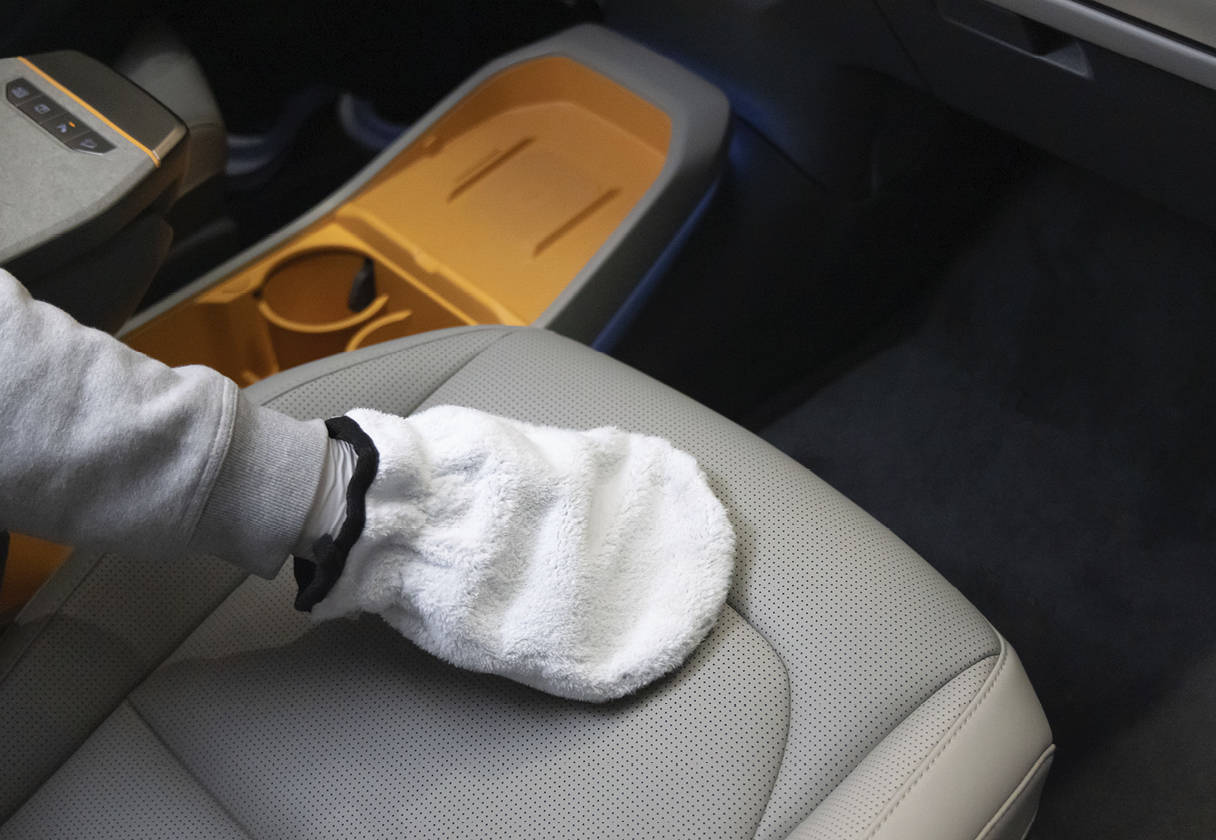 Wiping the leather seats inside the car