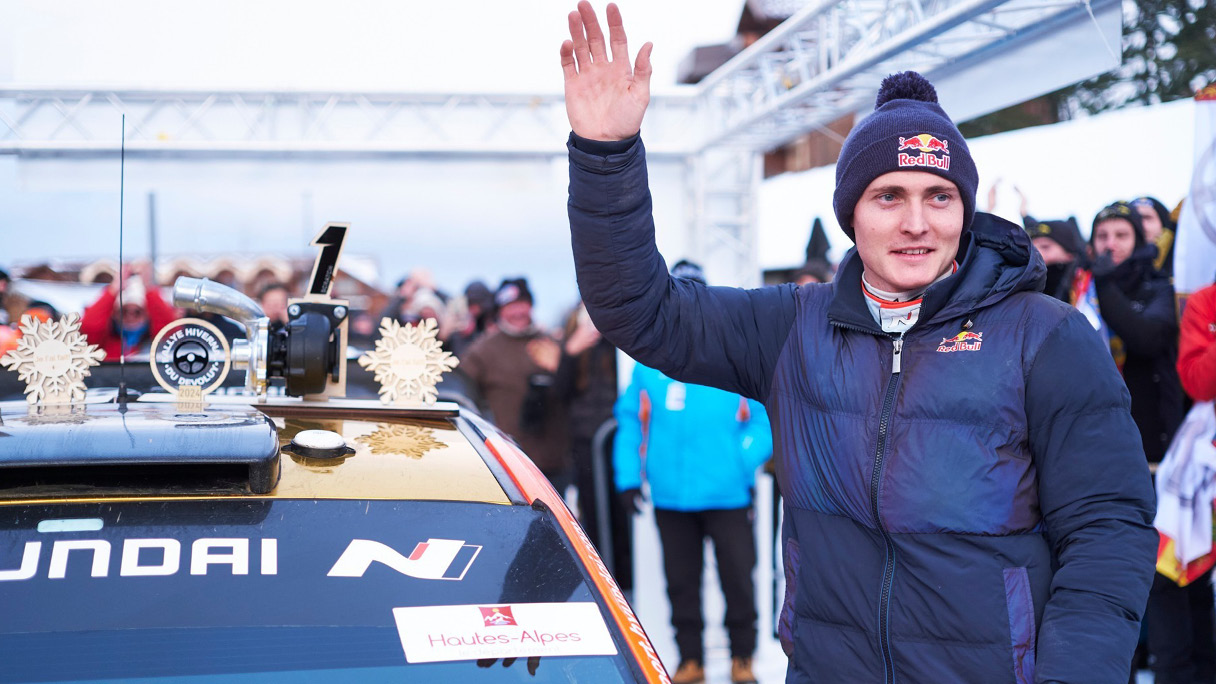 The Hyundai driver is waving to the audience