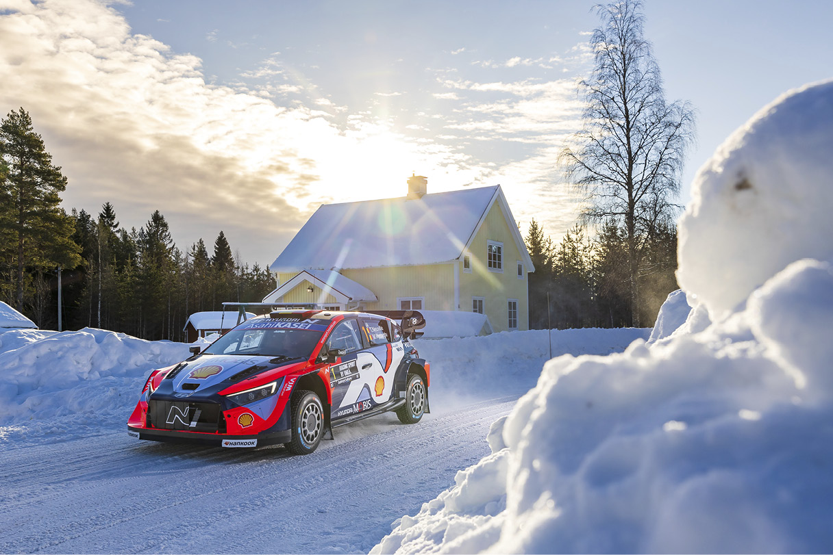 a rally car on a snowy field
