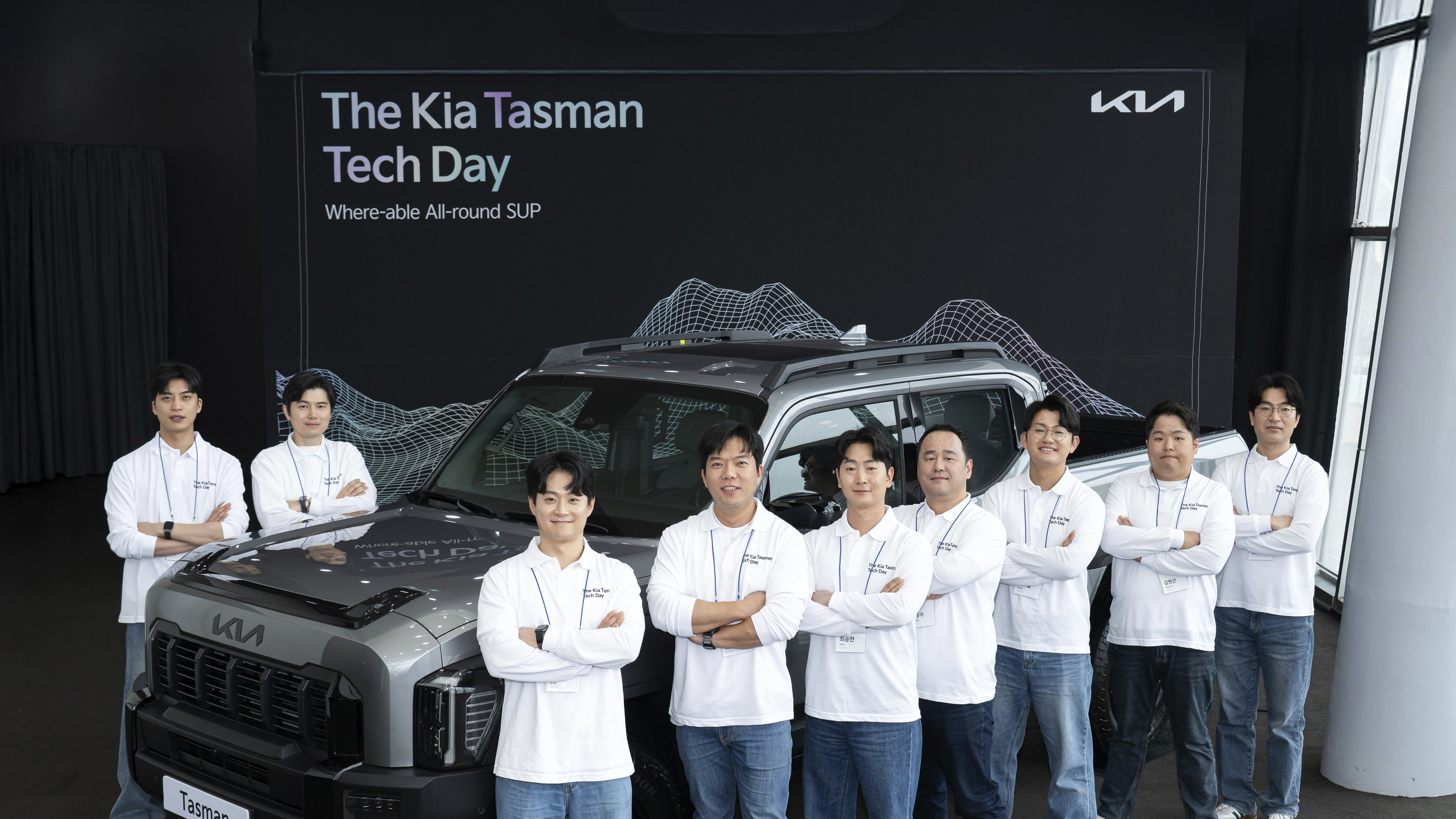 Researchers standing with Tasman