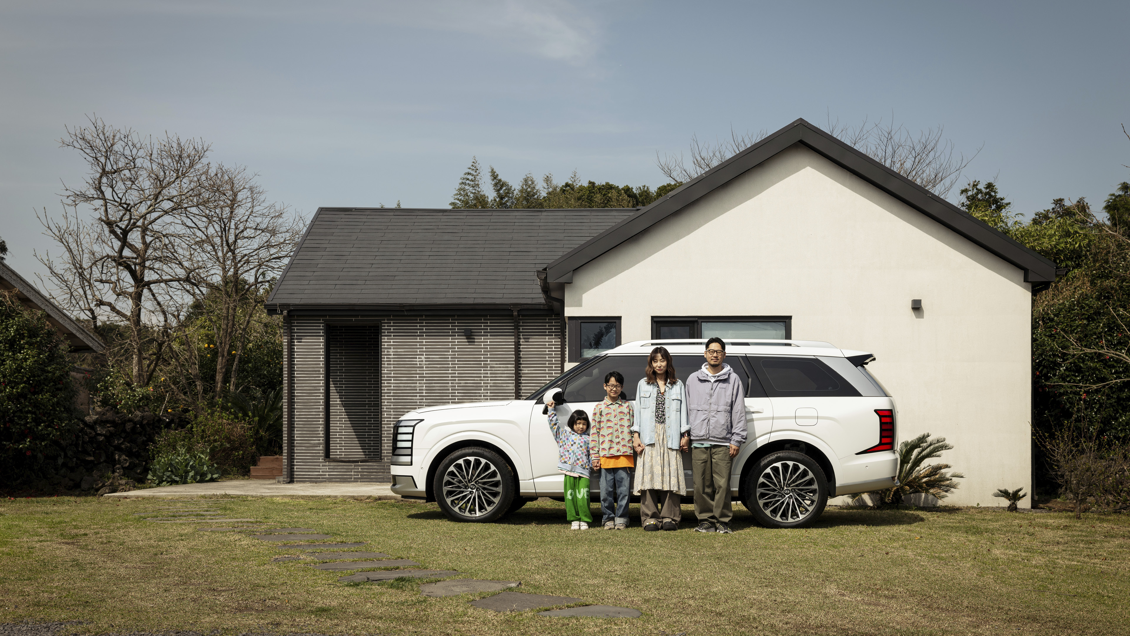 Family members standing with Palisades