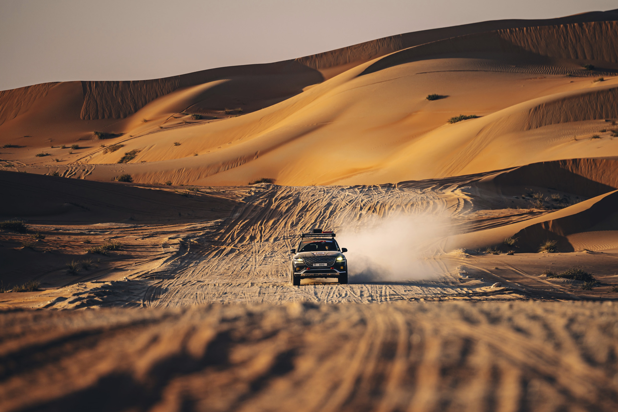 The image of GV80 running through the desert