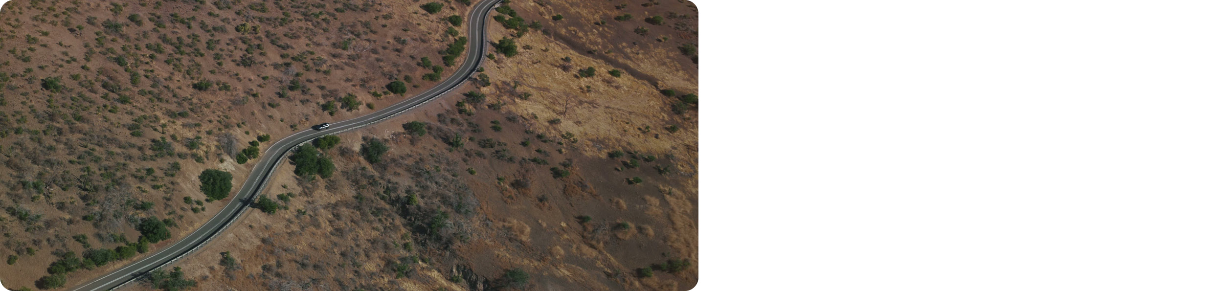 Kia EV9 running on a path with a great scenery
