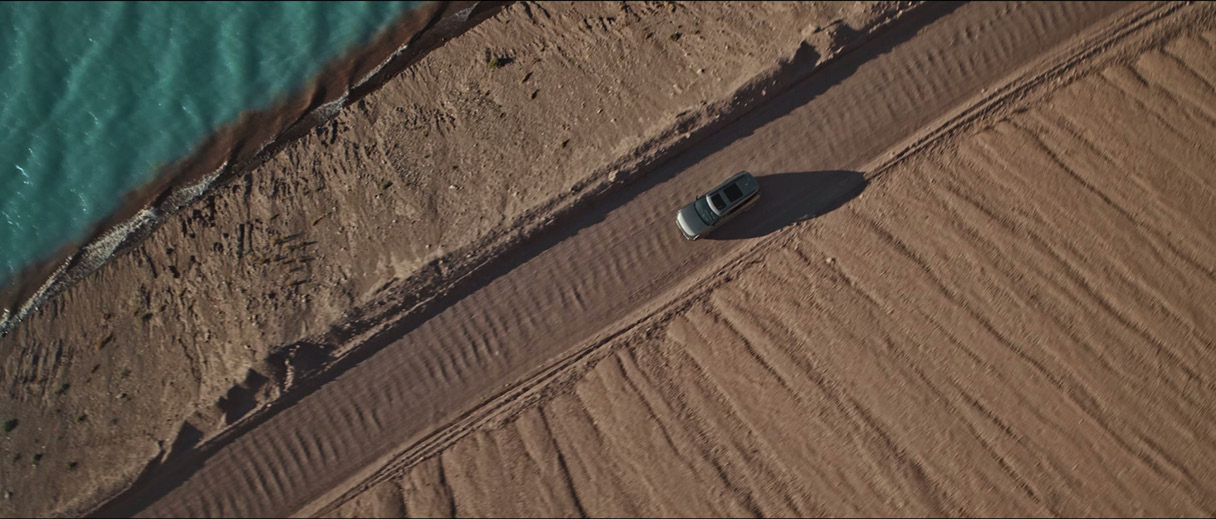 Kia EV9 running on a path with a great scenery