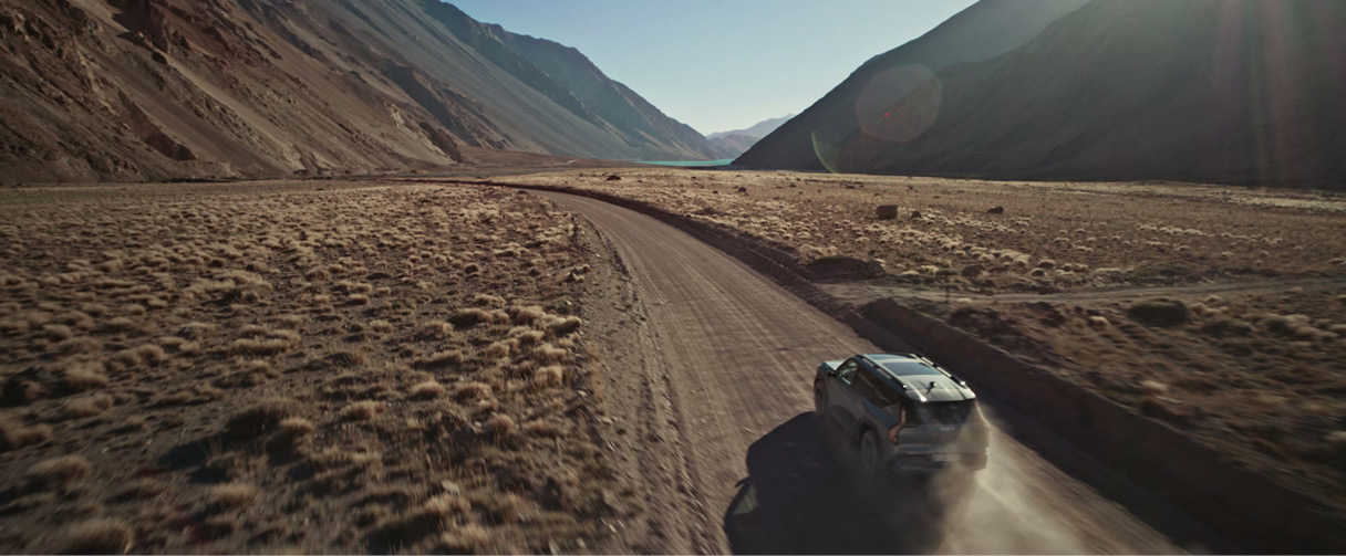 Kia EV9 running on a path with a great scenery