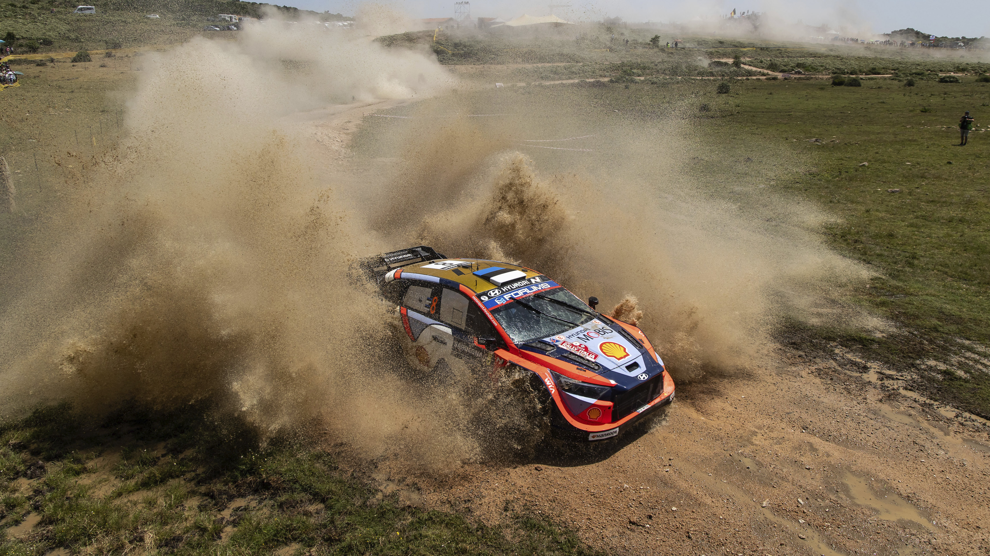 Hyundai team's rally car driving on unpaved roads