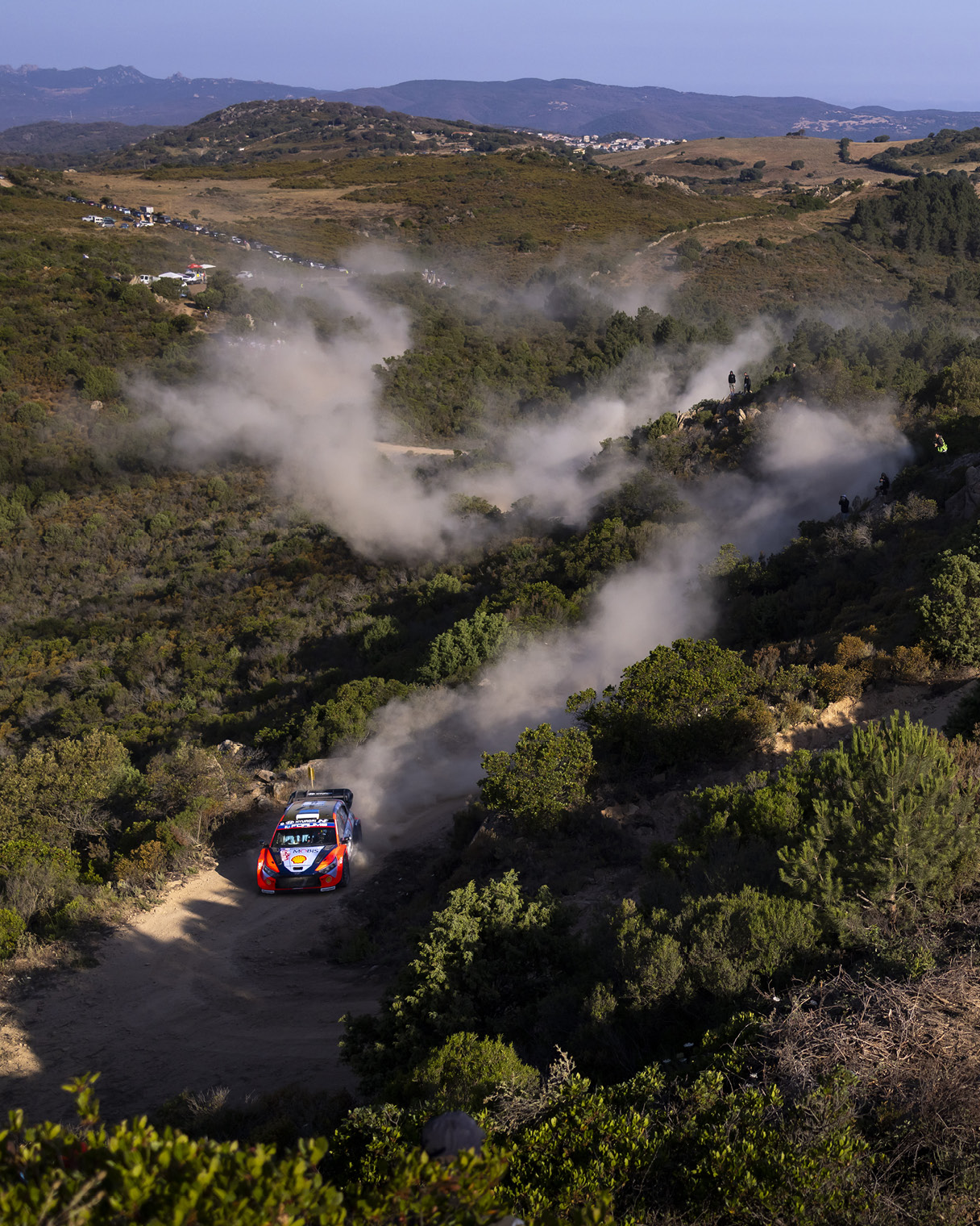 Hyundai team's rally car driving on unpaved roads