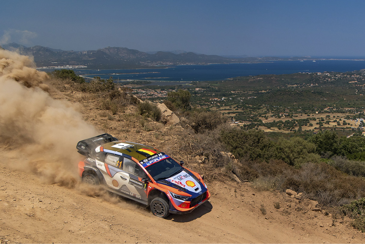 Hyundai team's rally car driving on unpaved roads