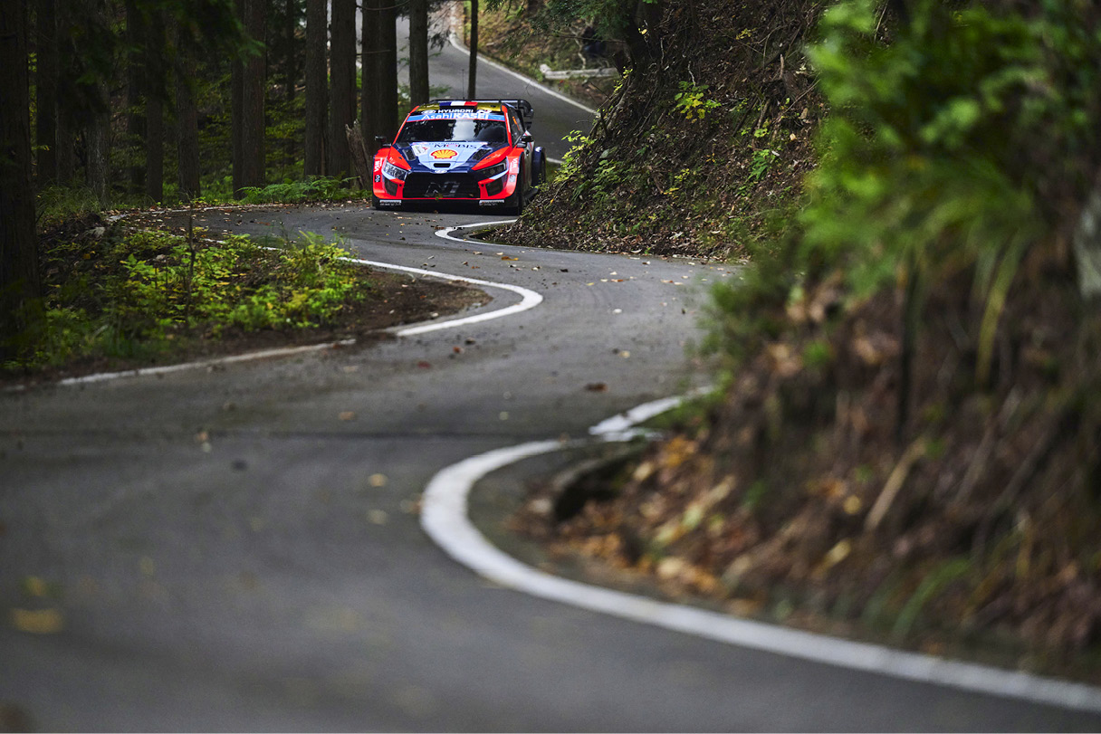 Hyundai Team Rally Car Driving on the Forest Road