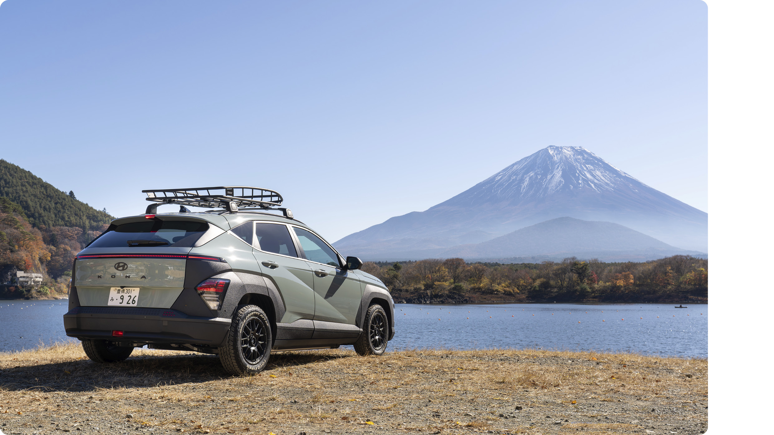 Hyundai Kona Electric Standing in the Background of Mount Fuji