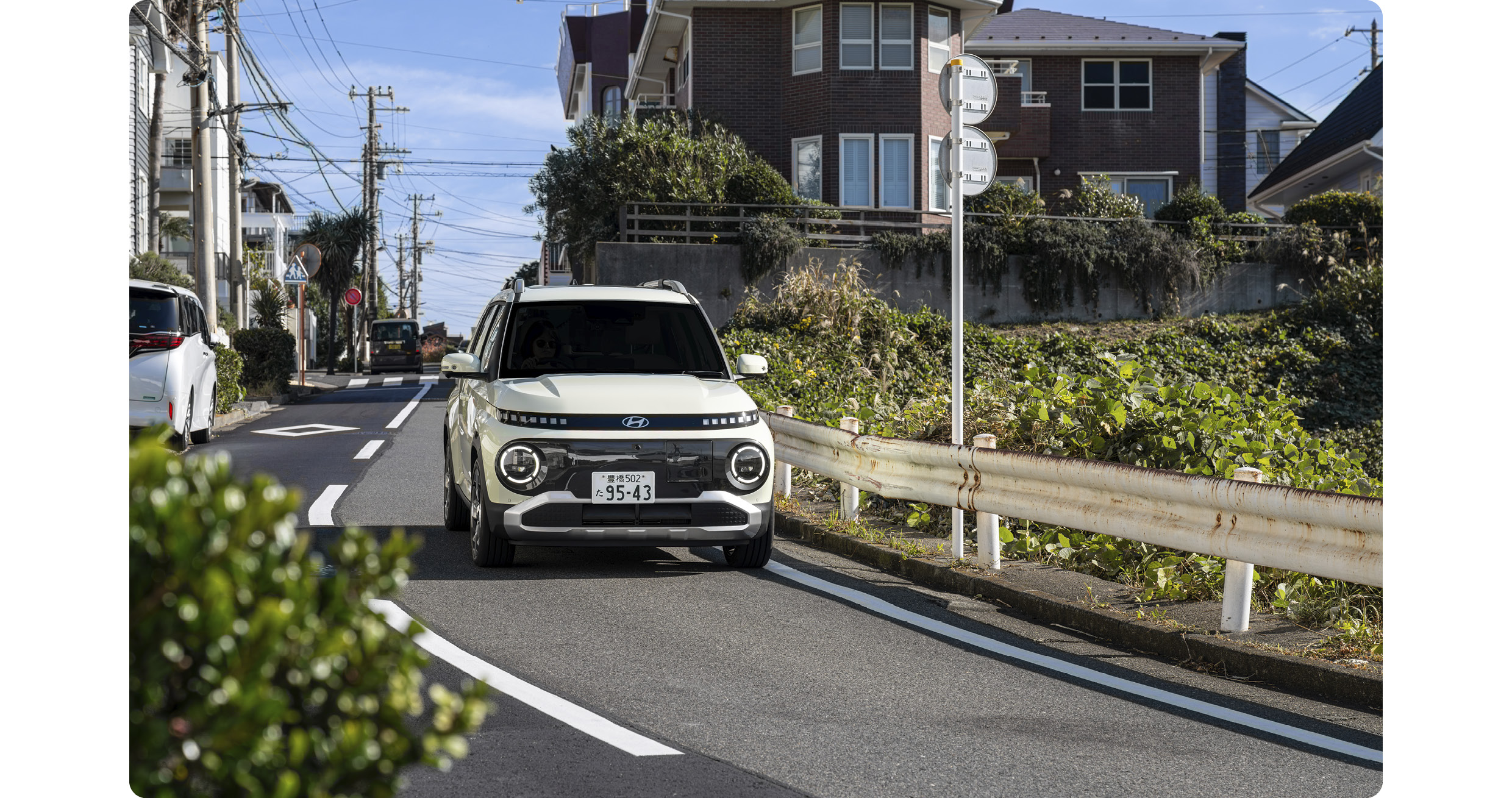 A view of Hyundai Inster driving in Japan