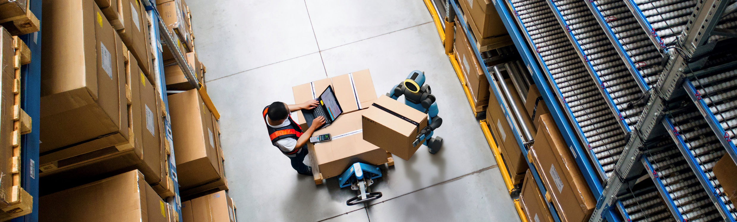 Worker and an Atlas robot interact with each other at work.