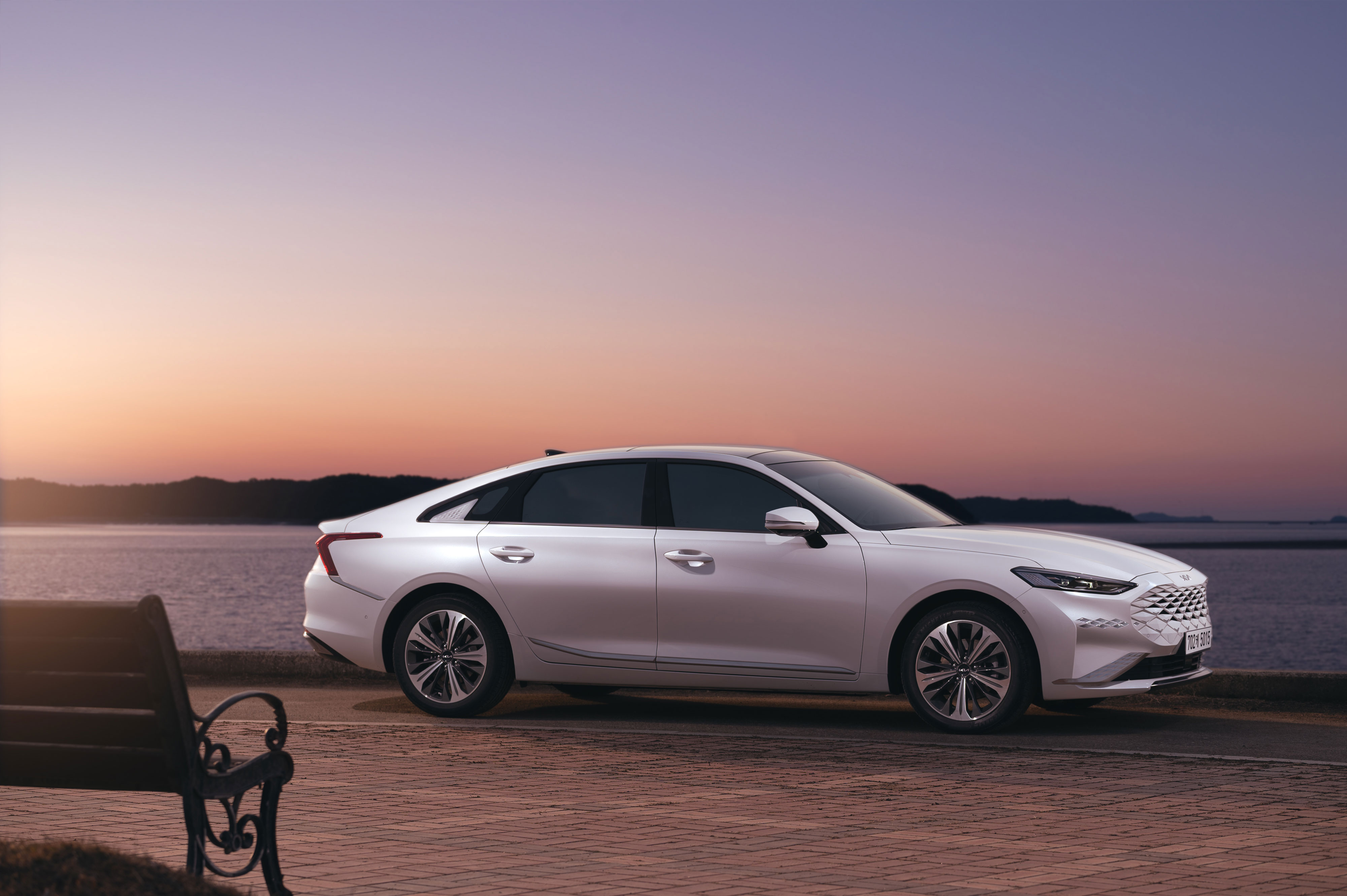 Admire the sunset from the premium comfort of the Kia K8 (1)