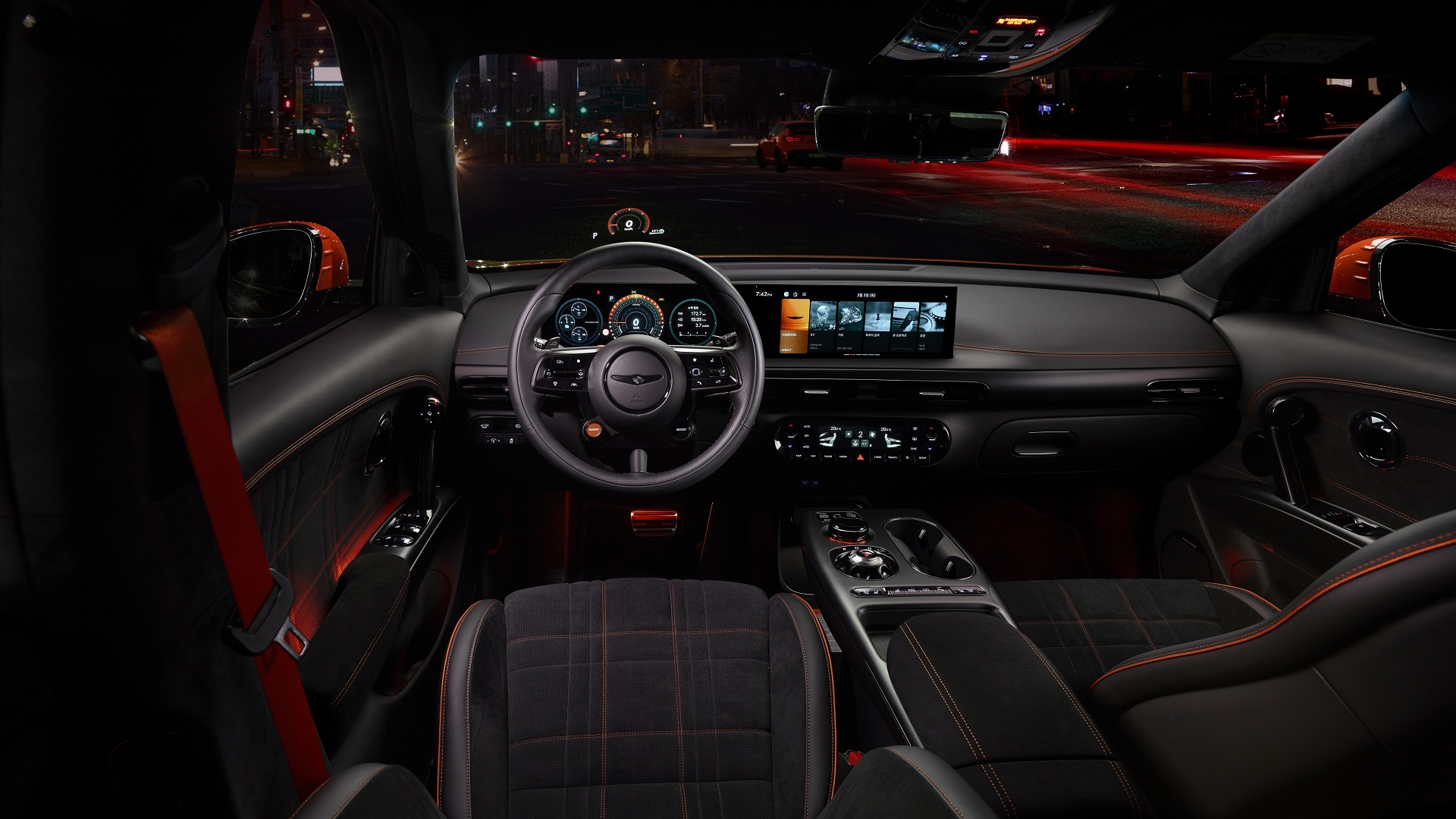 밤이 깊어질수록 더 선명해지는 제네시스 GV60 마그마의 실루엣.