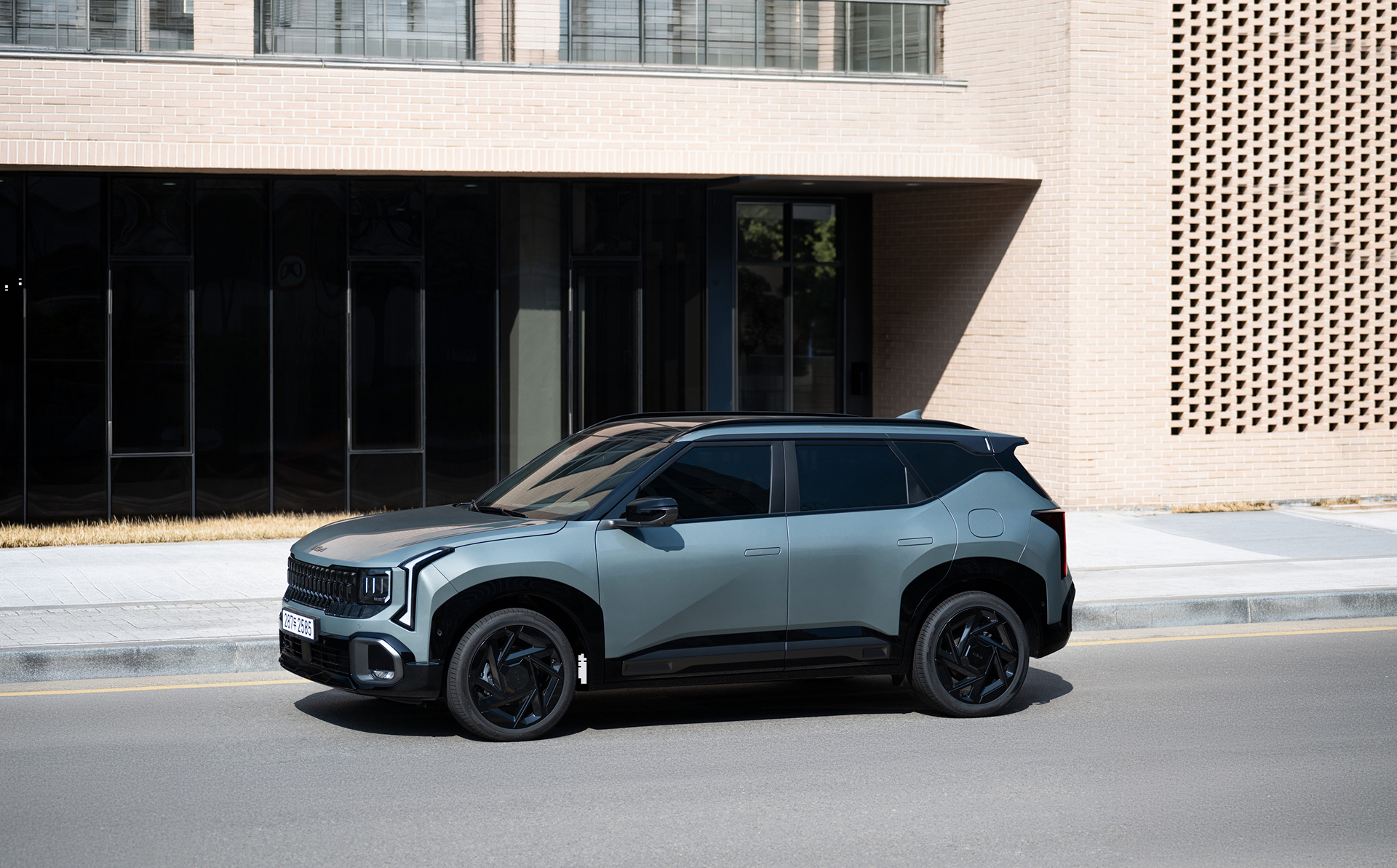 Side view of the All-New Seltos X-Line on the road