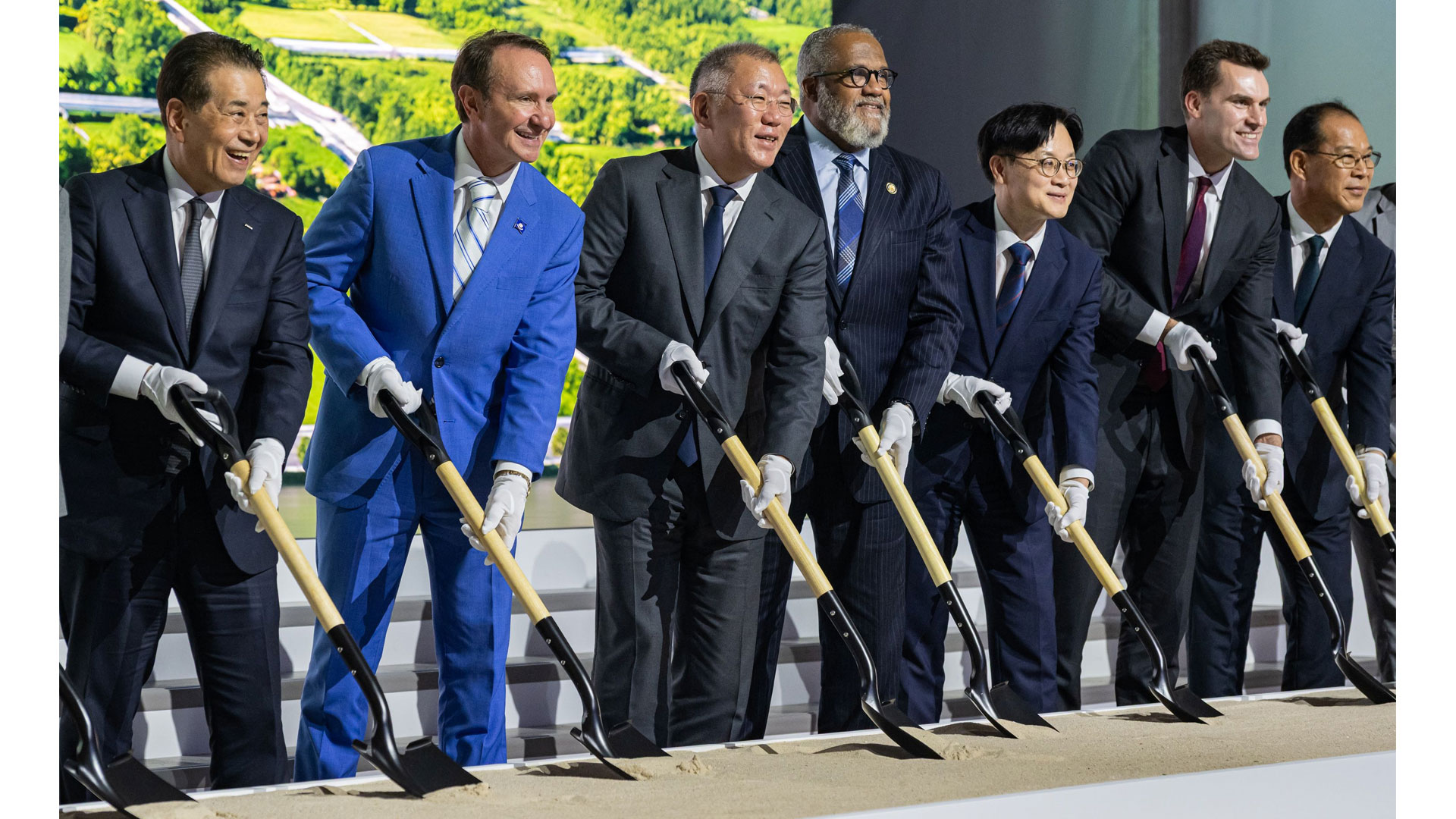 Key attendees at the groundbreaking ceremony break ground to mark the start of factory construction. From left: POSCO Group Chairman In-hwa Jang; Louisiana Governor Jeff Landry; Hyundai Motor Group Executive Chair Euisun Chung; U.S. Representative Troy Carter; Minister of Trade, Industry and Energy Jeong-kwan Kim; William Kimmitt, Deputy Under Secretary of Commerce for International Trade; and Hyundai Steel President Bo-ryong Lee.